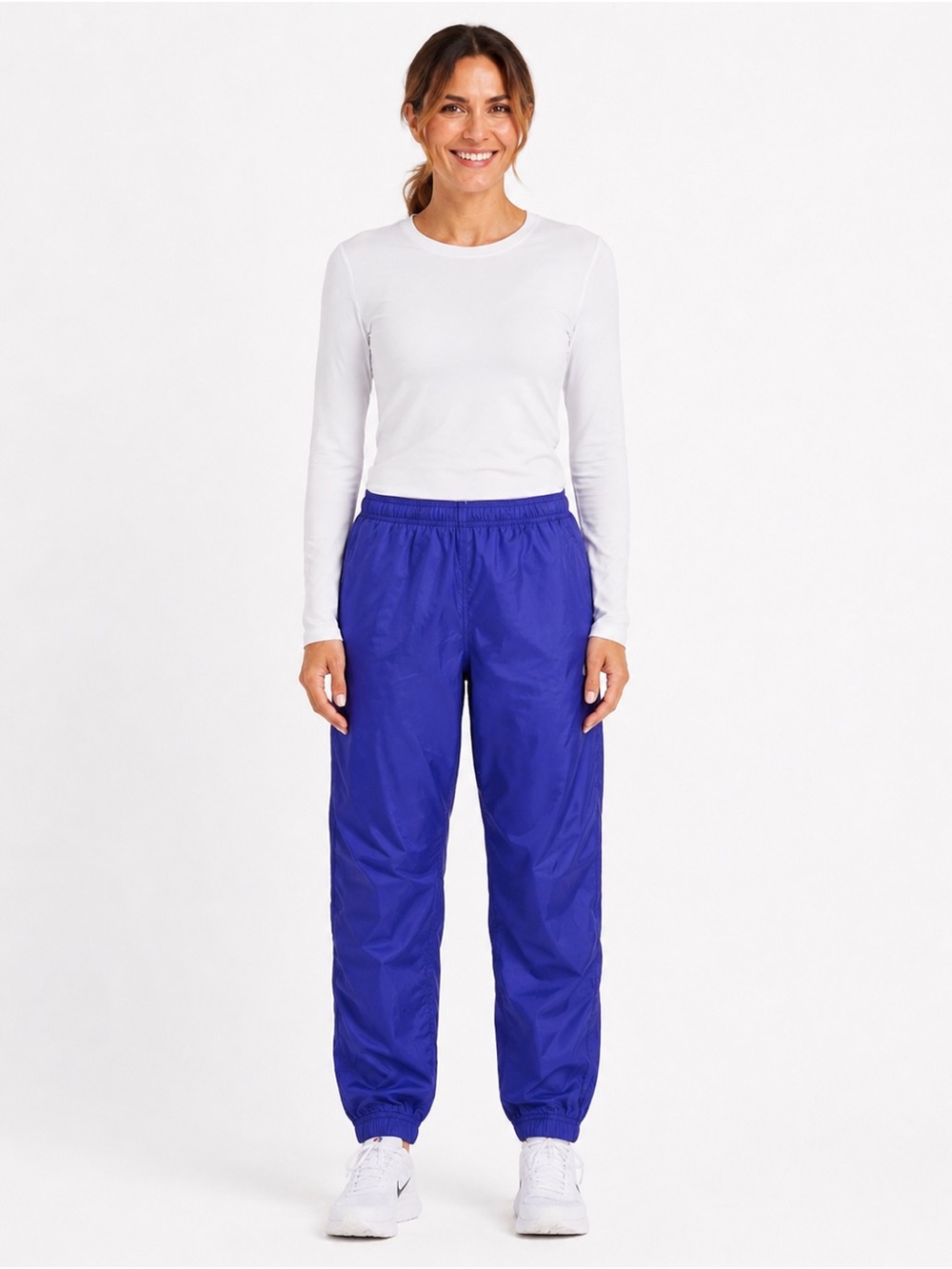 Nike wind pants jogger women’s size large (12-14) Purple